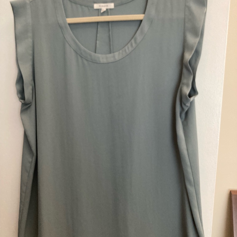 Miss green shirt